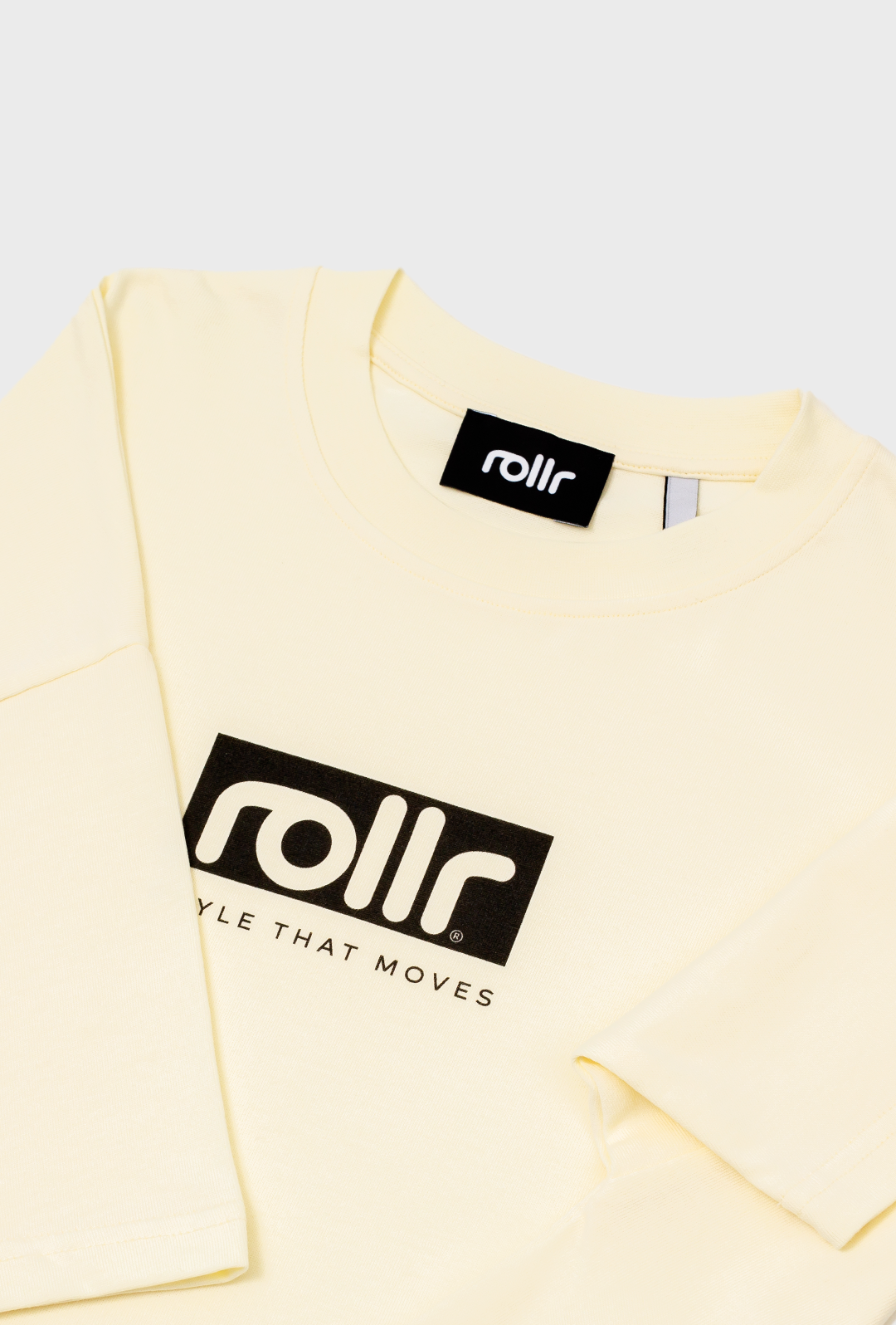 rollr clothing vanilla cream cropped tee by roller clothing, with rollr logo and style that moves printed tagline