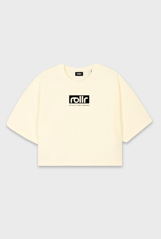 womens vanilla cream cropped tee by roller clothing, with rollr logo and style that moves printed tagline on front