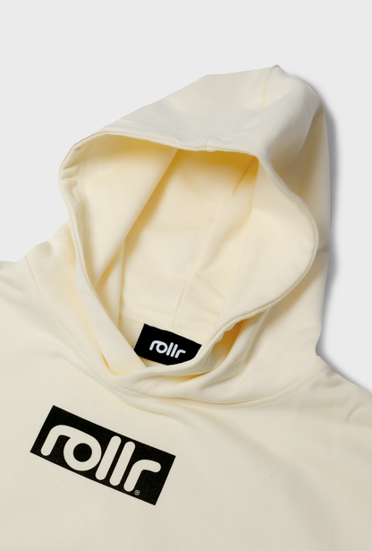 rollr clothing heavyweight vanilla cream box fit hoodie made from french terry fabric and rollr logo print and black label with rollr logo